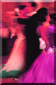 Couple dancing at the New Year's Eve Ball